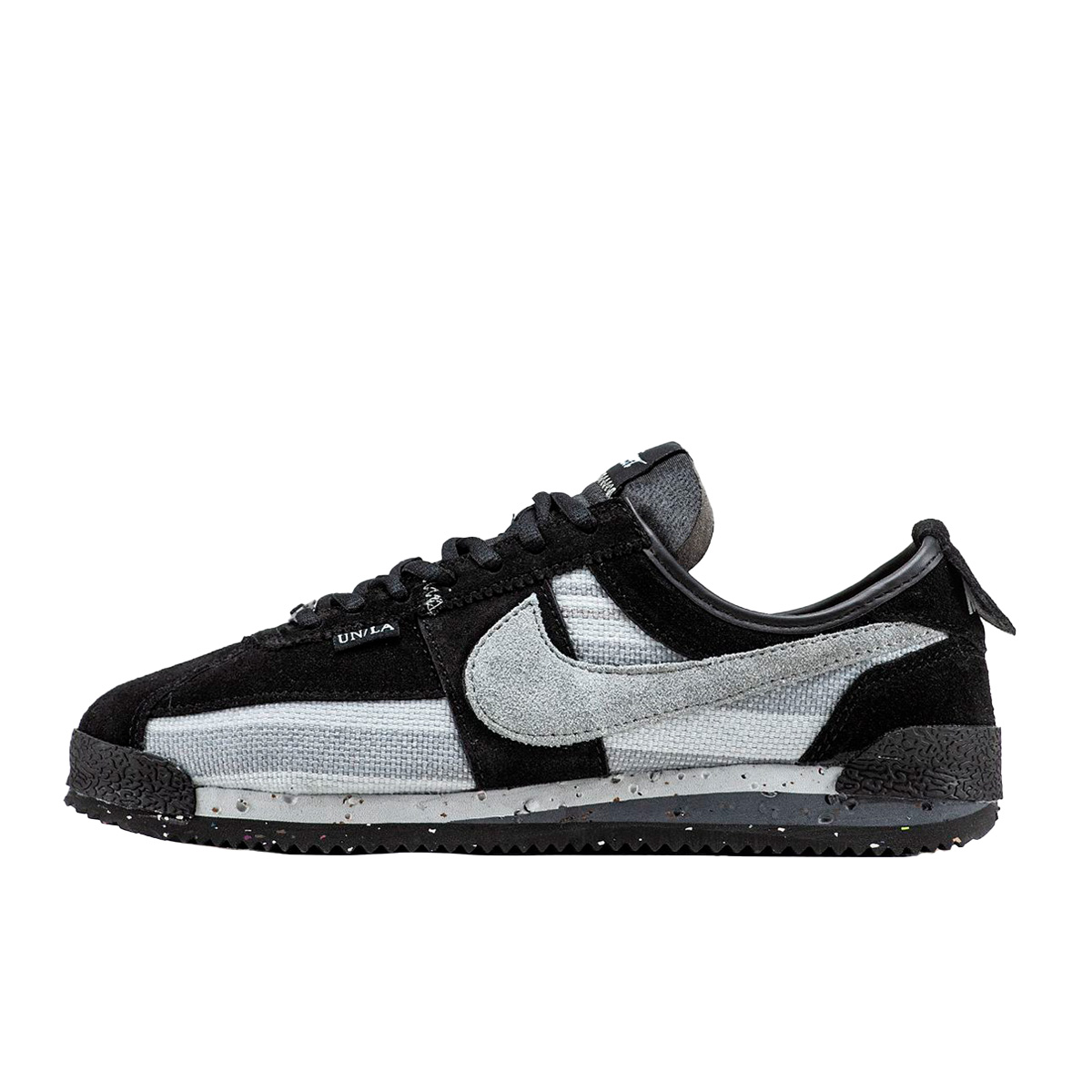 Grey and black nike cortez discount